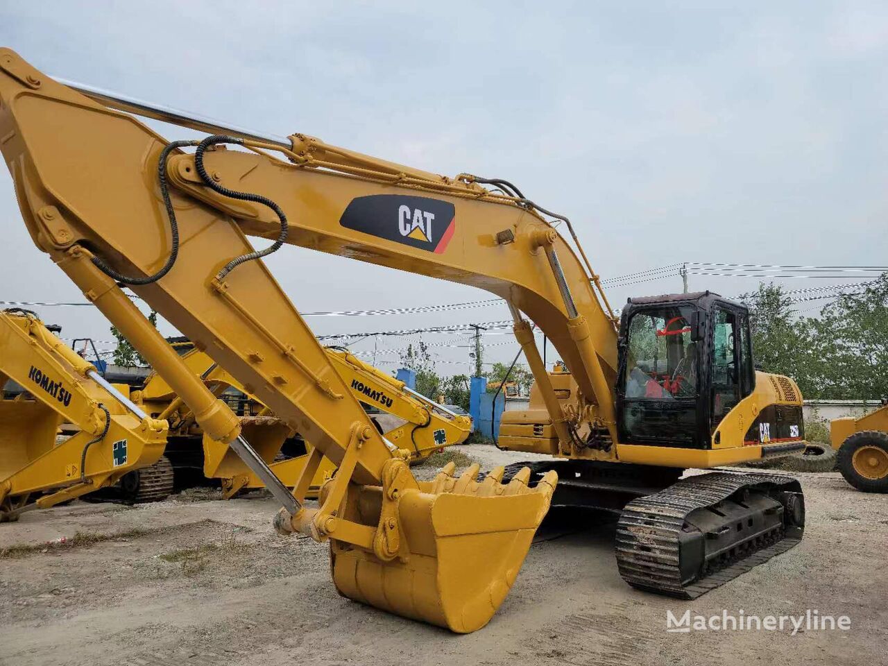 Caterpillar 325D beltegraver